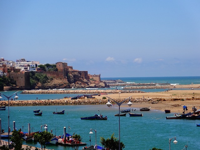Medieval view of Rabat, Morocco from the port with fishing boats.