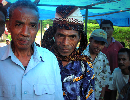 The intense eyes of the village elders.