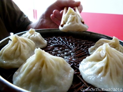 Enjoying Chinese dumplings.