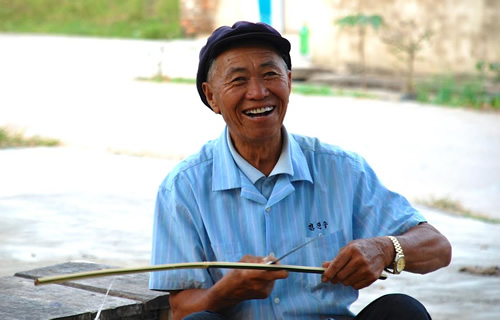 Man working outside during the summer in the south of China.