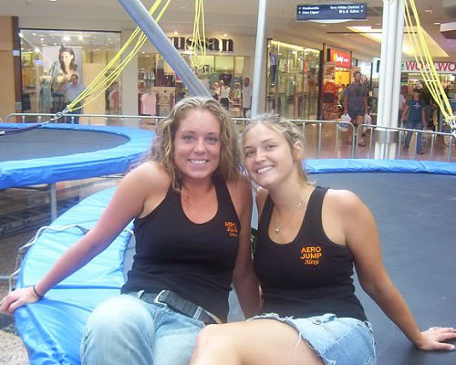 Two women doing work with trampolines in Australia.