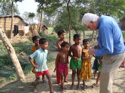 Showing photos, rural village, Rajshahi, Bangladesh