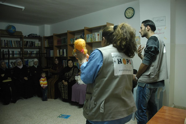 Palestinians listening to seminar