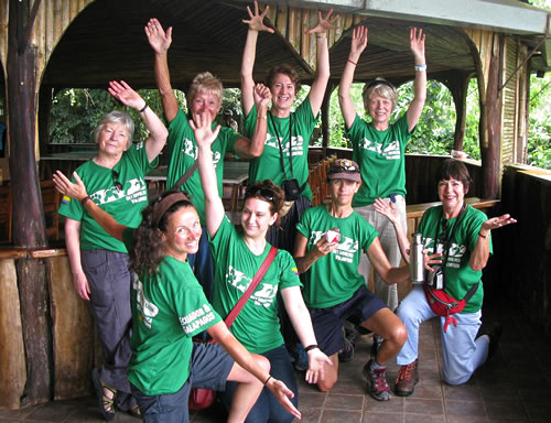 Volunteers feeding animals in Ecuador