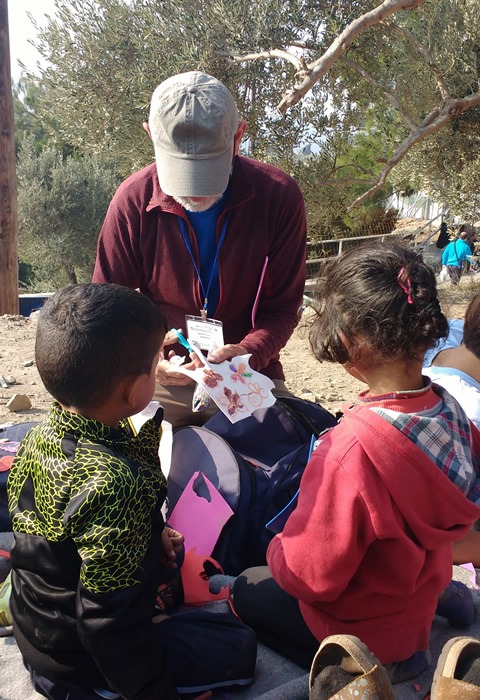 Playing with refugee children in Samos.