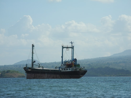 Sailing via cargo ship in the Pacific.