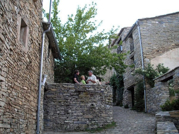 Volunteer in cobblestoned village of Valdelavilla