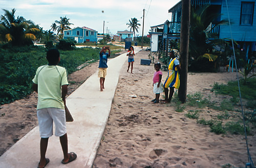 Local kids playing on world's narrowest street