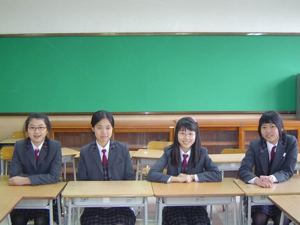 Uniformed public school students in class