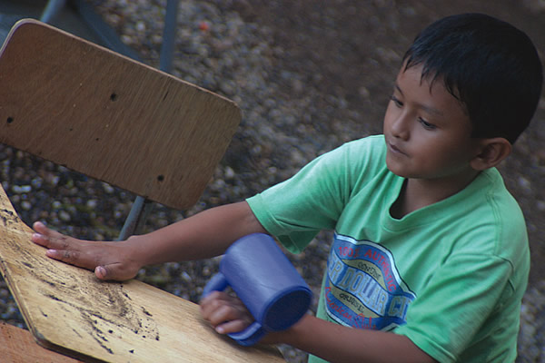 Child washing desk at Casa Guatemala