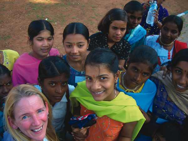 Beth Whitman in India with local women