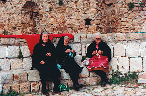 Women crocheting in Ragusa, Sicily.