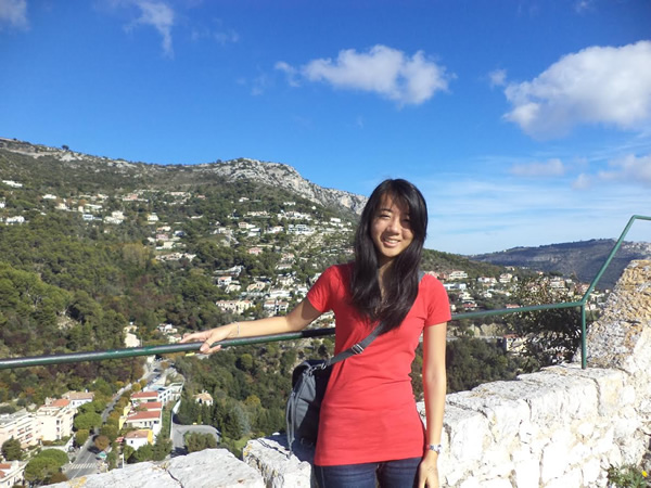 The author standing in a garden in spectacular upper Èze, France.
