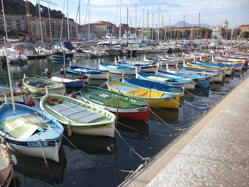 Boats moored at a port in Nice, France.
